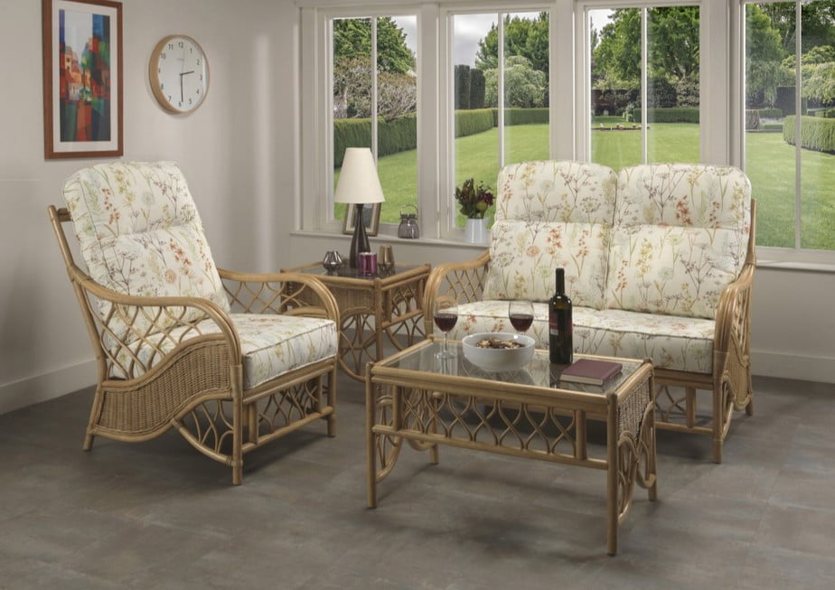 Medium Oak Bernado Cane Conservatory 2 seater Sofa and 2x Armchairs. Room setting.