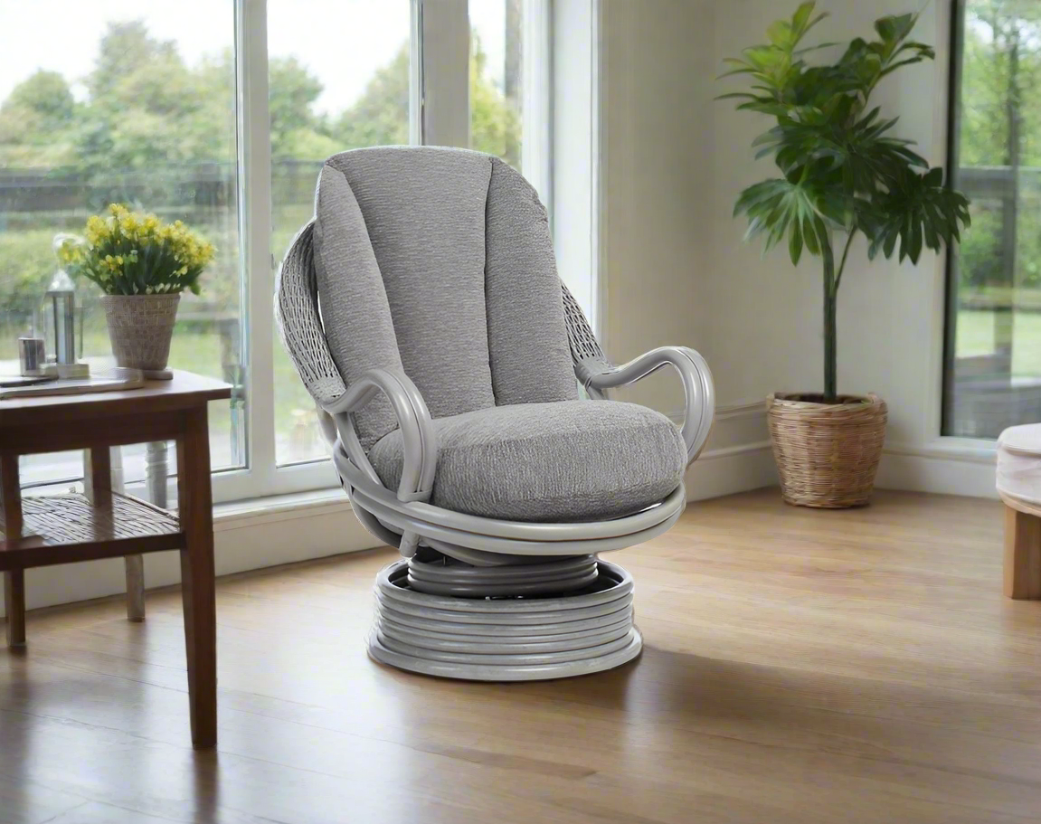 Cane Conservatory Rocker Swivel Chair.