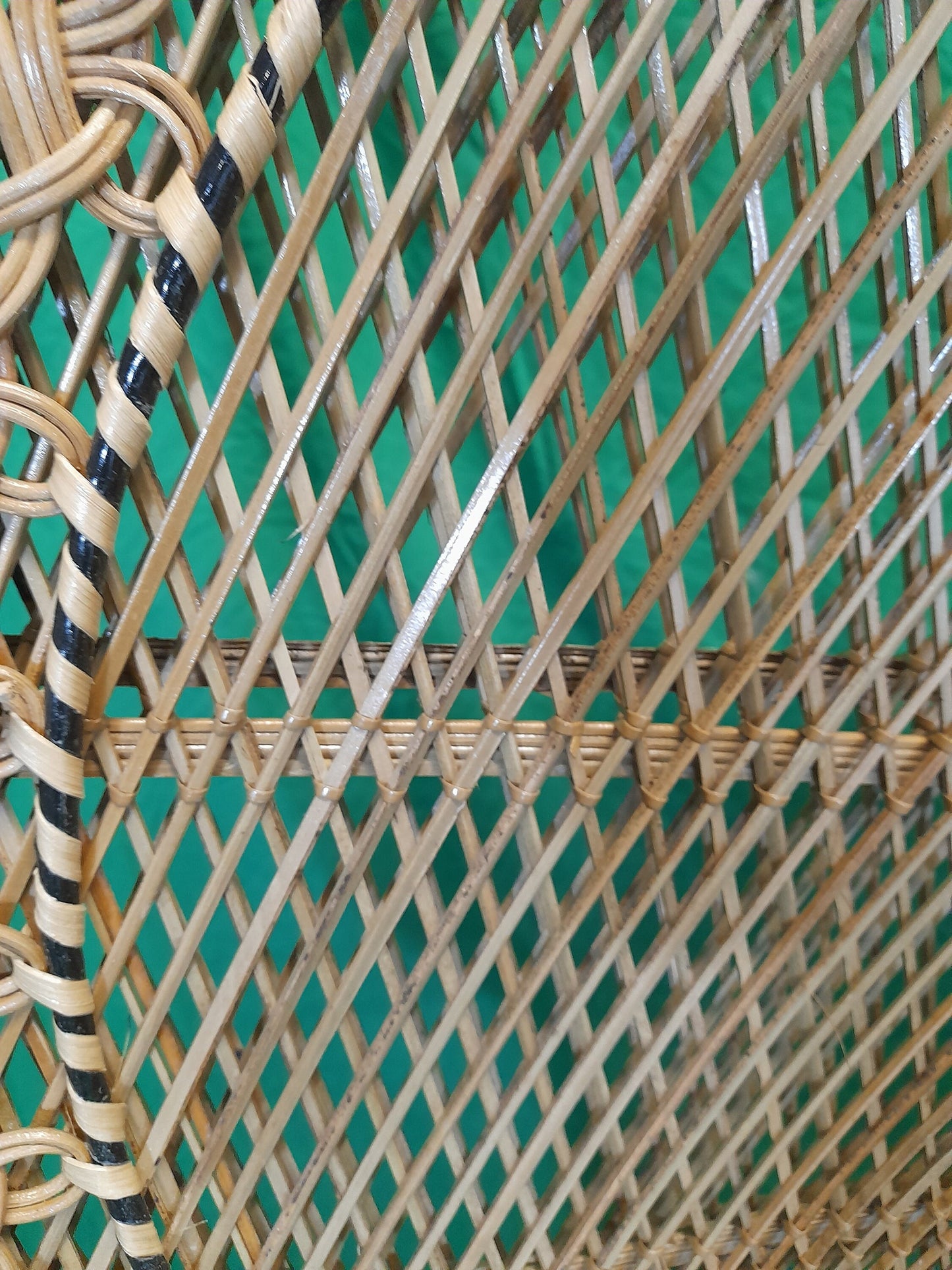 Wicker/Rattan Regal Conservatory Peacock Chair weave close up.