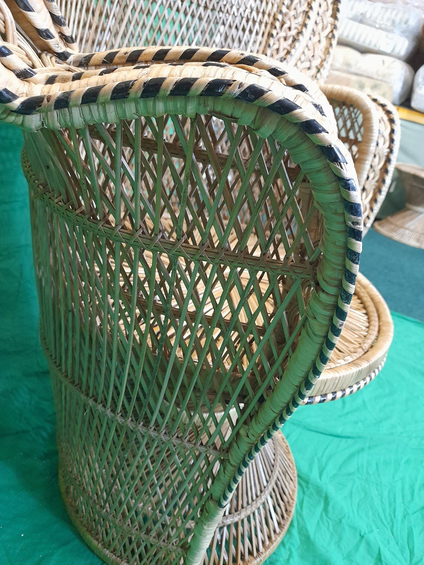 Wicker/Rattan Regal Conservatory Peacock Chair arm.