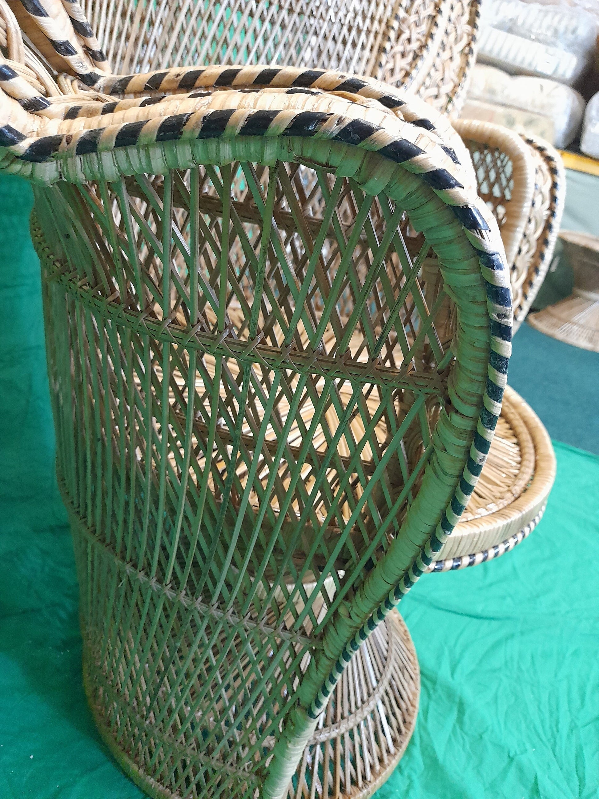 Wicker/Rattan Regal Conservatory Peacock Chair arm.