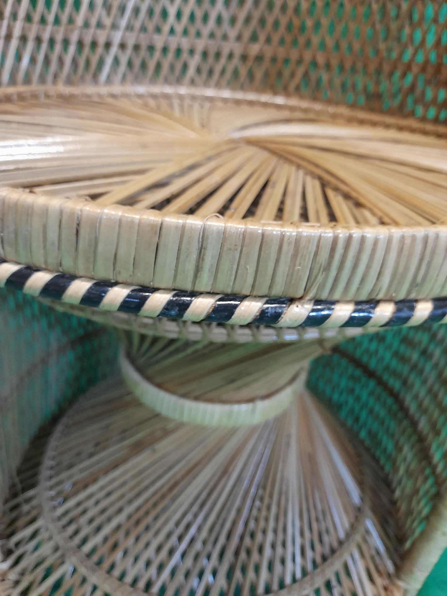 Wicker/Rattan Regal Conservatory Peacock Chair seat close up.